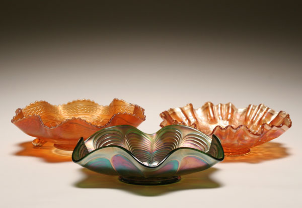 Appraisal: Three carnival glass bowls Fenton peacock and serpent