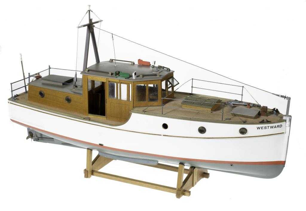 Appraisal: A PAINTED WOOD MODEL OF THE MOTOR CRUISER WESTWARD finished