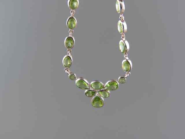 Appraisal: Peridot Necklace vivid gems totaling over carats in sterling silver