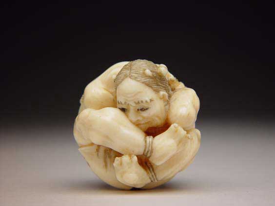 Appraisal: CARVED IVORY NETSUKE Amusing contemporary carved ivory netsuke of an