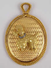 Appraisal: Cartier A gold pendant mirror with a ruby and diamond