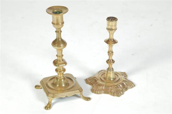 Appraisal: TWO BRASS CANDLESTICKS Continental th century One with raised Queen