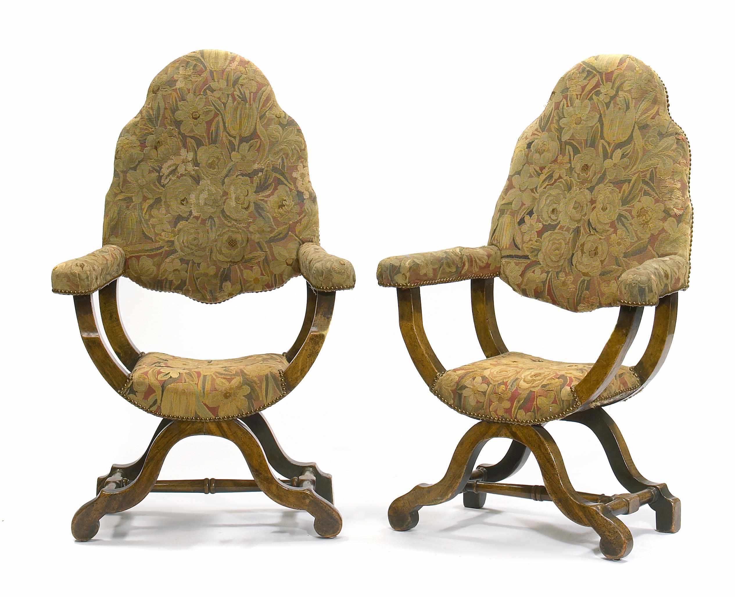 Appraisal: A pair of Italian Baroque style walnut armchairs height in