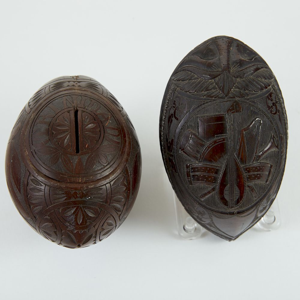 Appraisal: Carved Coconuts th- th c Group of two carved coconuts