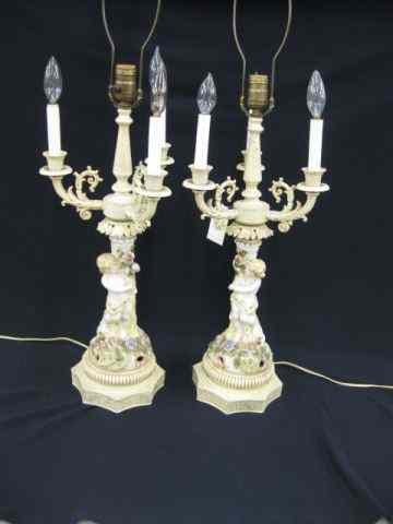 Appraisal: Pair of Figural Porcelain Table Lamps putti floral candelabra type