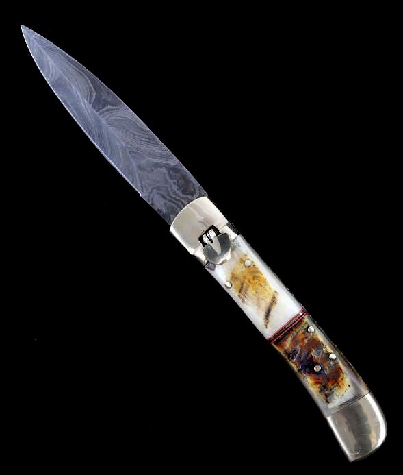 Appraisal: German Damascus Lever Lock Switchblade Knife This is a German