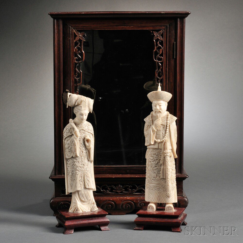 Appraisal: Ivory Carvings of a Couple China th th century dressed