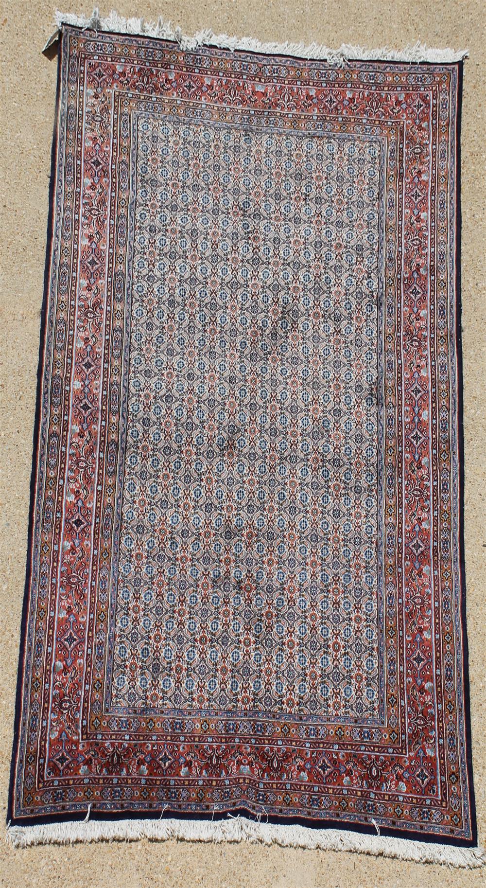 Appraisal: BIJAR WOOL RUG rust black blues brick taupe on a