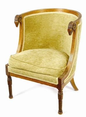 Appraisal: An Empire style mahogany tub shaped chair the reeded edge