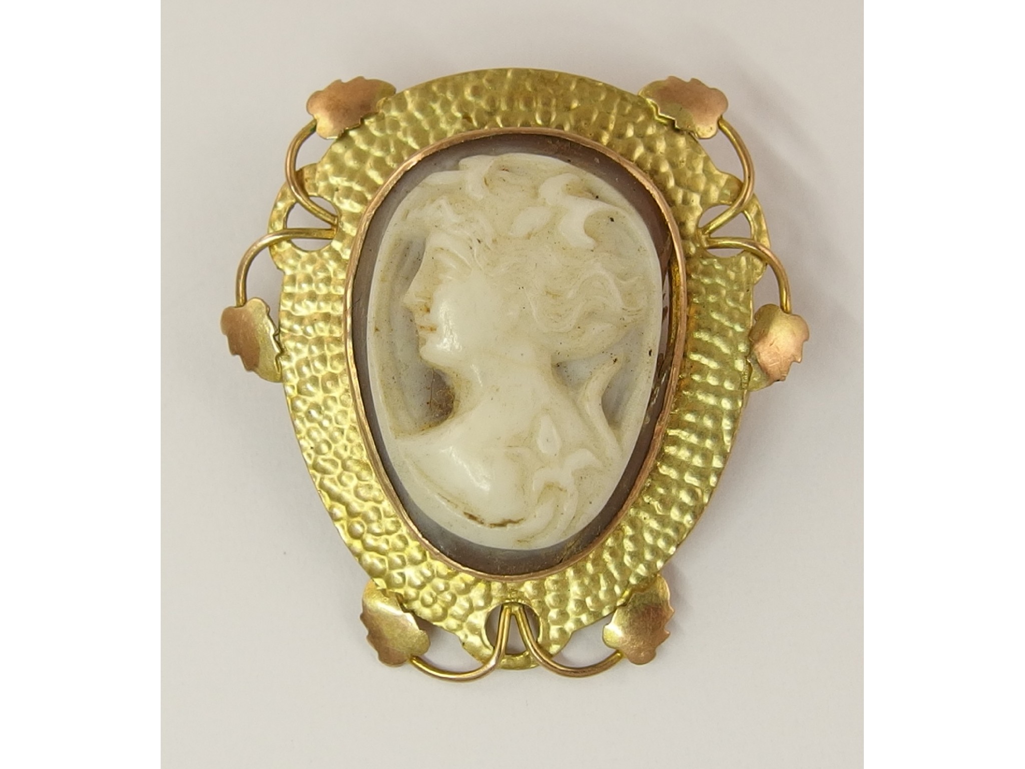 Appraisal: A ct bicolour gold Arts Crafts mounted shell cameo broochby