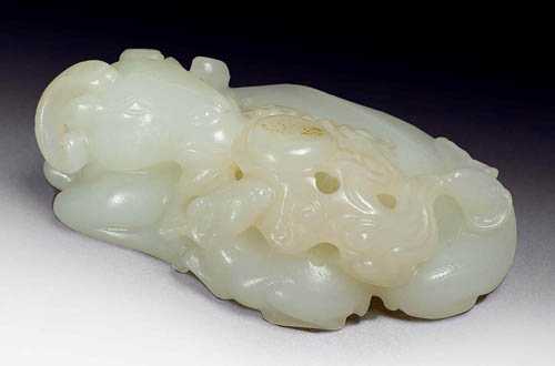 Appraisal: THREE GOATS China th century L cm White jade with