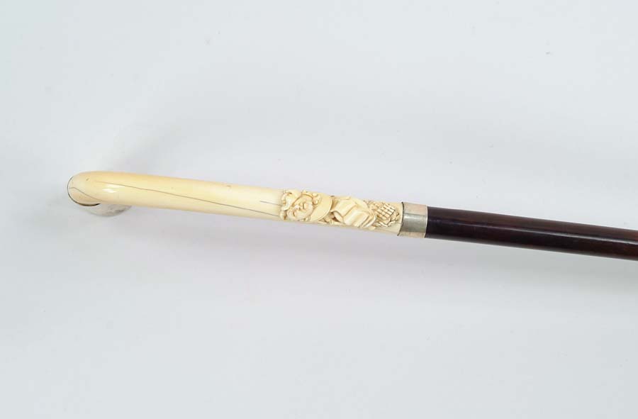 Appraisal: CANE FINE CARVED IVORY SILVER AND ROSEWOOD CANE carved ivory