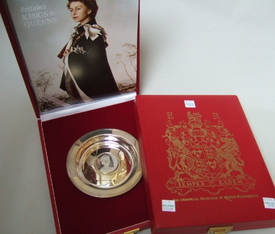 Appraisal: A silver circular commemorative dish detailed Queen Elizabeth II Royal