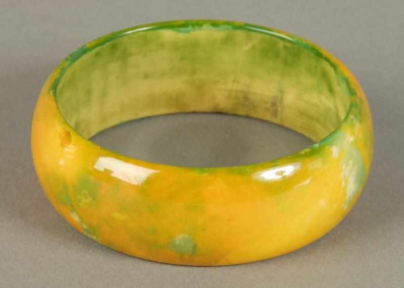 Appraisal: Unusual Bakelite -Tone Green Yellow Bracelet Condition Excellent Size -