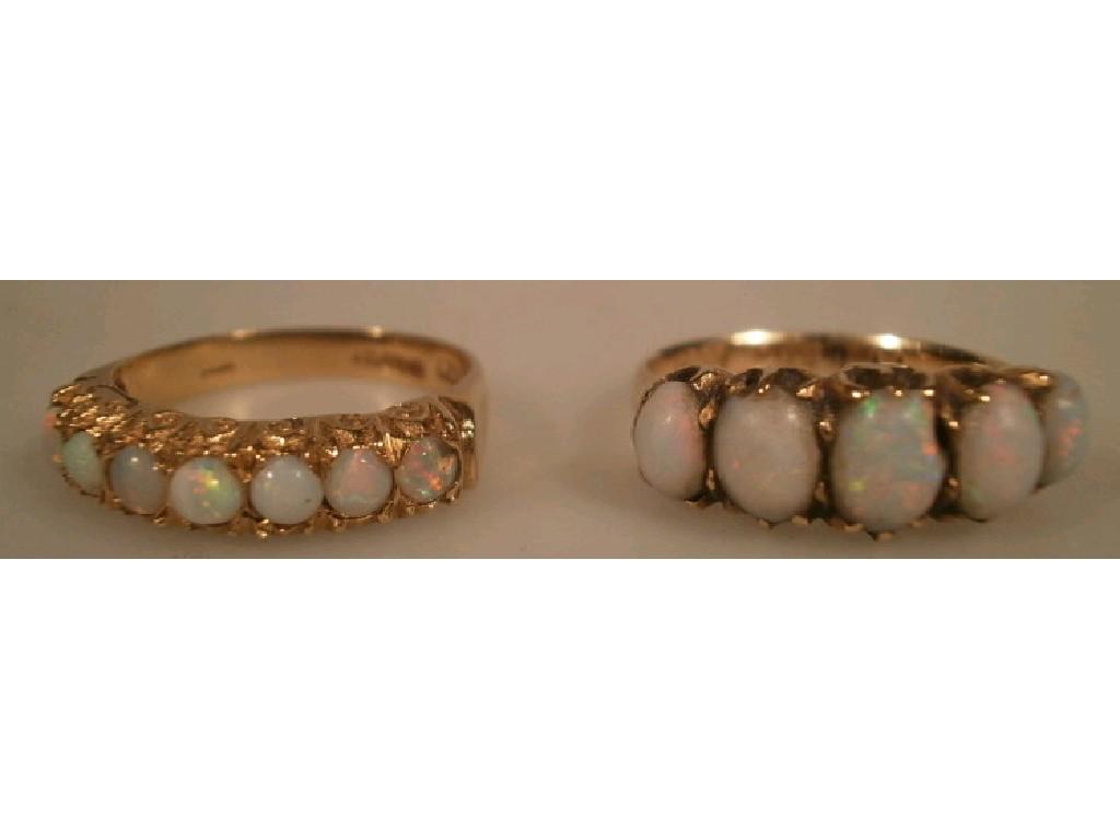 Appraisal: Two ct opal set dress rings