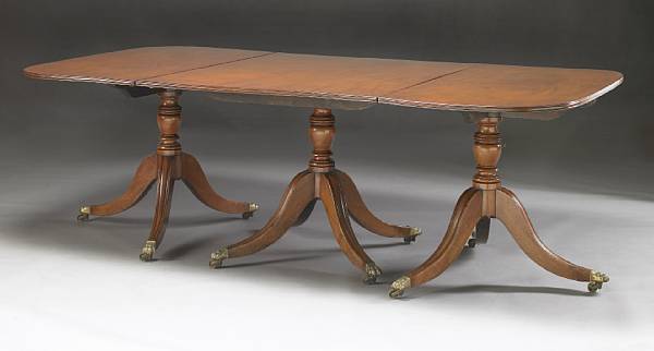 Appraisal: A George III mahogany triple pedestal dining table late th