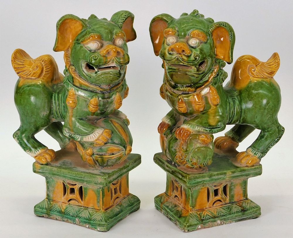 Appraisal: PR Chinese Opposing Sancai Foo Lion Statues China Qing Dynasty