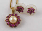 Appraisal: A carat gold ruby and cultured pearl pendant on a