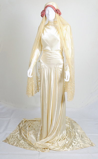 Appraisal: A s style cream satin wedding dress high neck long