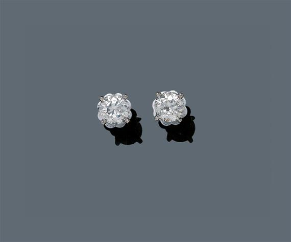 Appraisal: DIAMOND EAR STUDS White gold Classic solitaire ear studs each