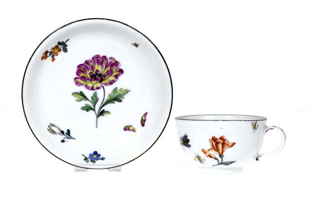 Appraisal: A MEISSEN TEACUP AND A SAUCER the saucer painted to