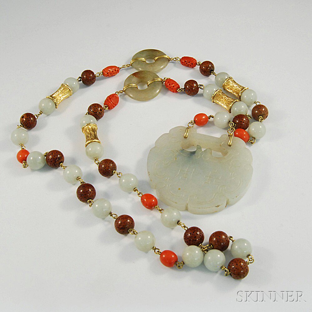 Appraisal: Jade Bead Necklace with carved jade plaque-form pendant suspended from