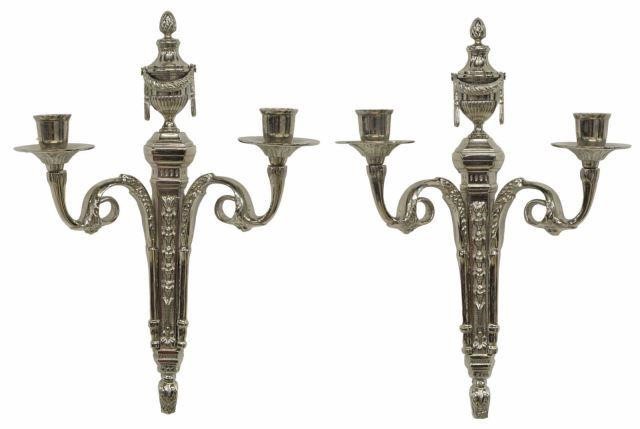 Appraisal: pair Louis XVI style polished nickel-plated brass two-light candle sconces