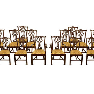 Appraisal: A Set of Fourteen George III Style Mahogany Dining Chairs