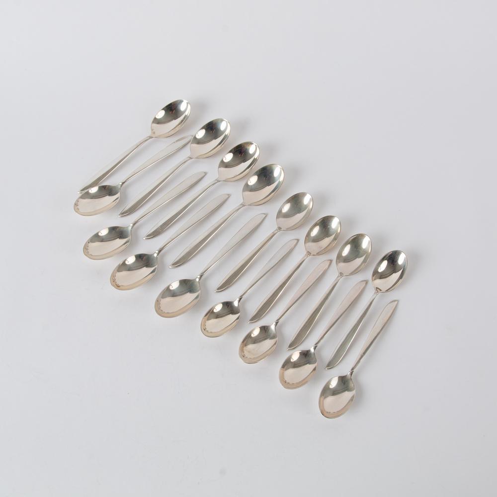 Appraisal: INTERNATIONAL STERLING 'SILVER RHYTHM' SPOONS OZT A -piece International Sterling