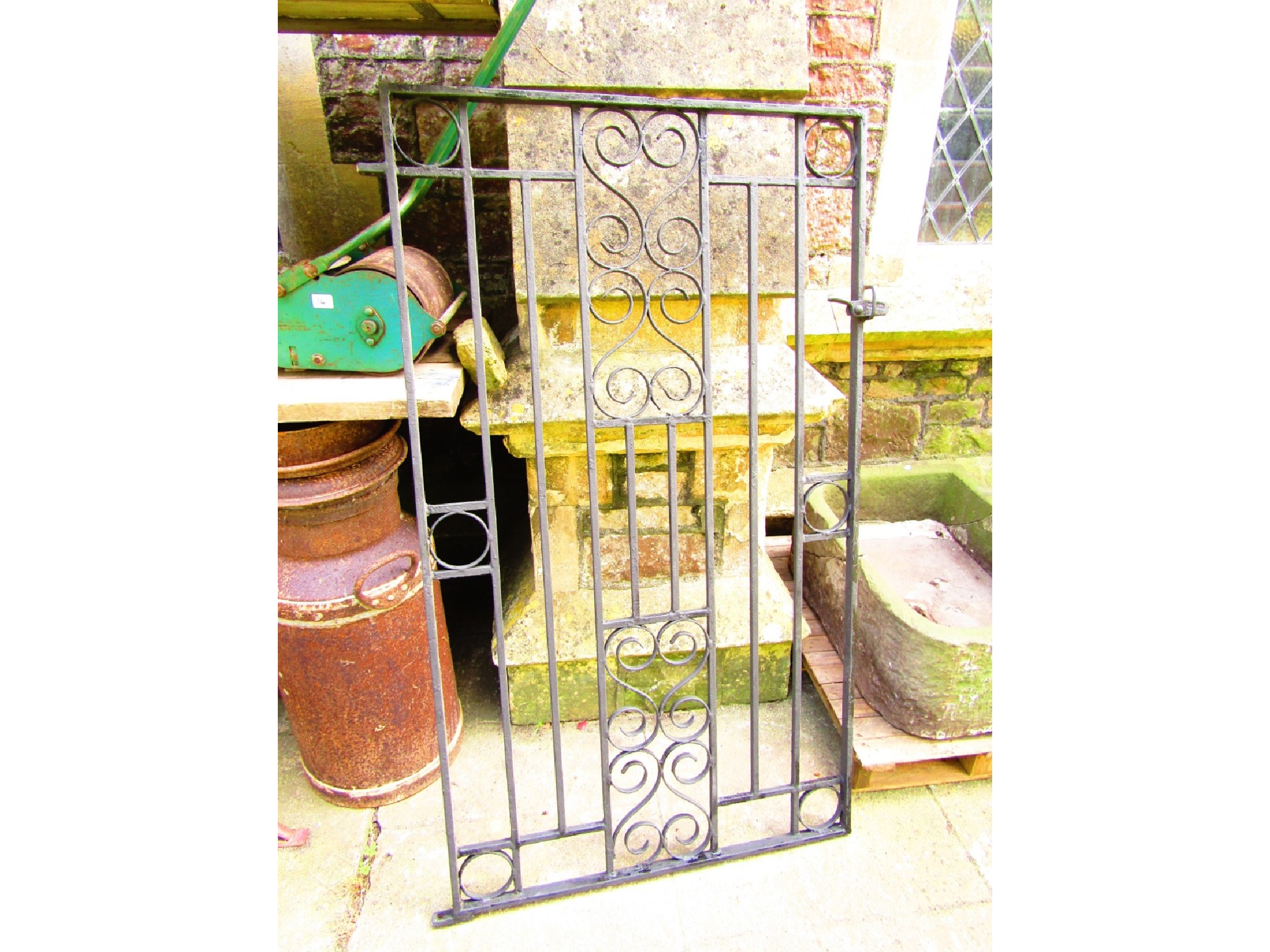 Appraisal: A heavy cast iron pedestrian gate with scroll work detail