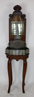 Appraisal: French Provincial pewter lavabo on walnut stand French Provincial pewter