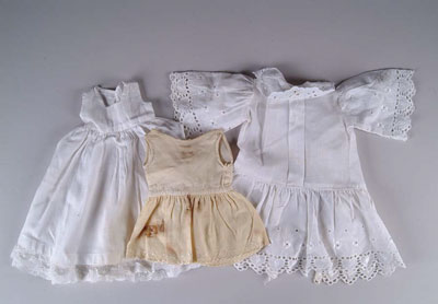 Appraisal: PIECES OF ASSORTED DOLL DRESSES Various sizes CONDITION Good to