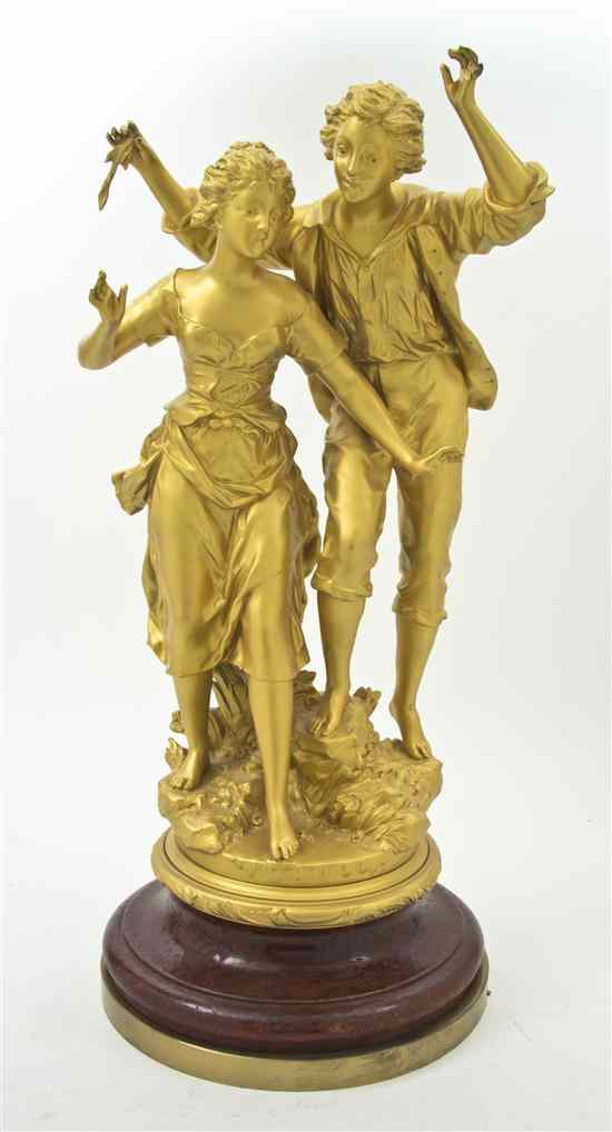 Appraisal: A Gilt Metal Figural Group depicting a provincial lady and