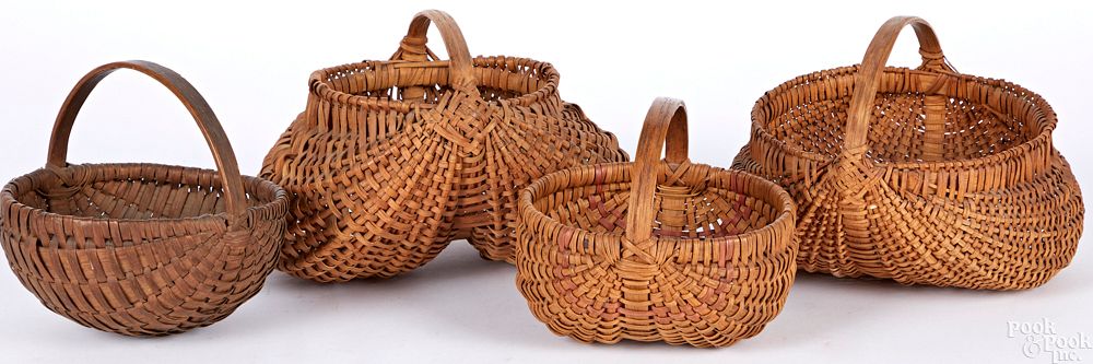 Appraisal: Four small splint oak baskets Four small splint oak baskets