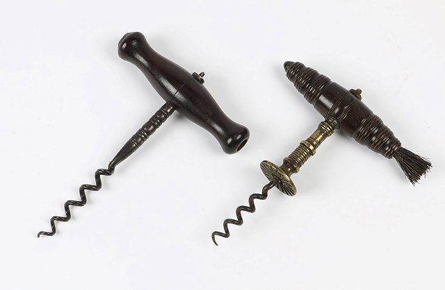 Appraisal: A BRASS AND STEEL STRAIGHT PULL CORKSCREW with a Henshall