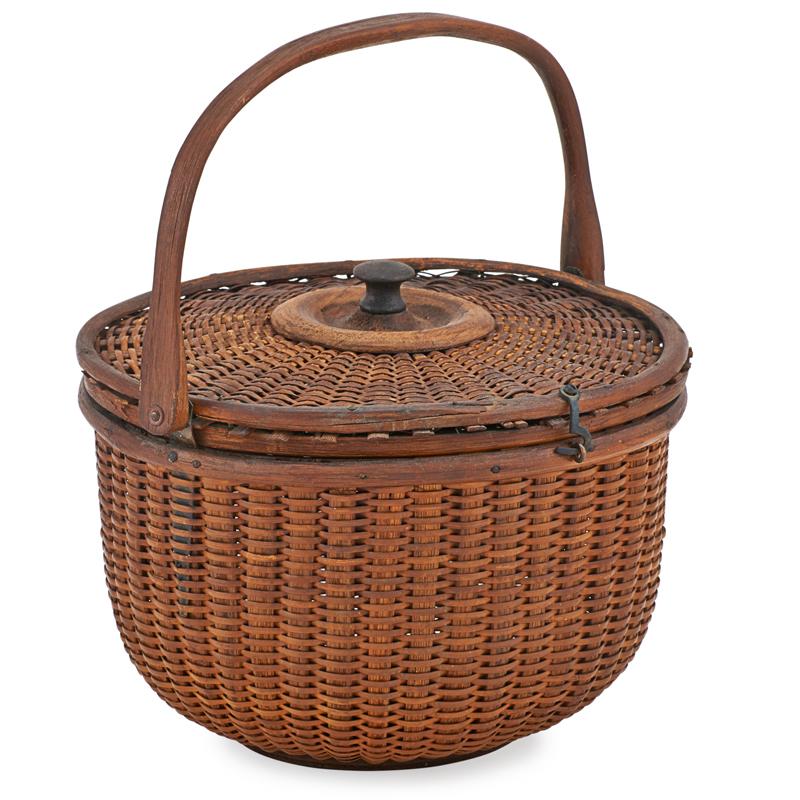 Appraisal: NANTUCKET SWING HANDLED BASKET Hickory lidded basket early th c