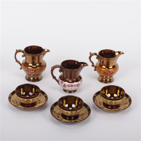 Appraisal: Nine piece th century porcelain copper Lusterware including three cups