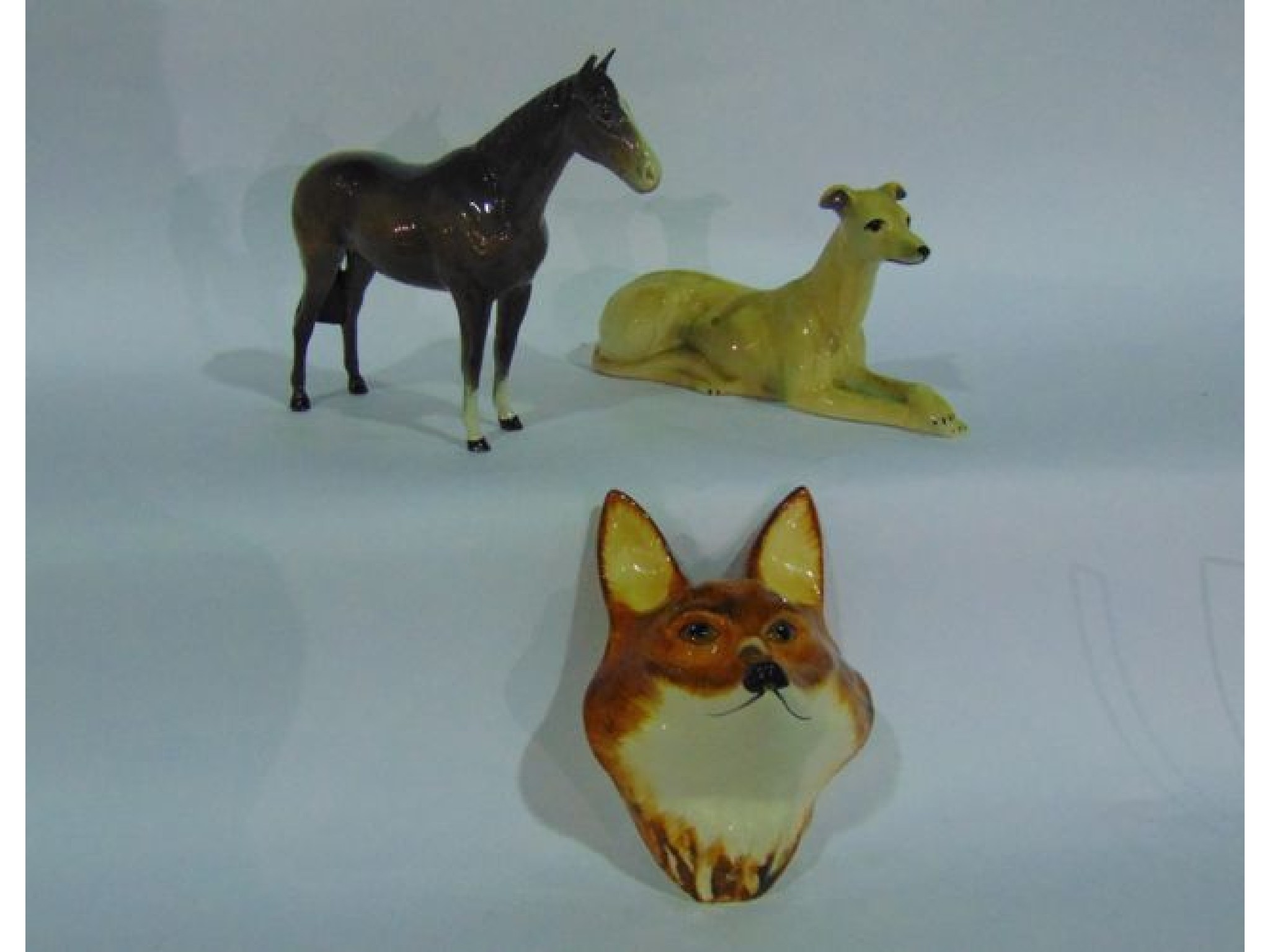 Appraisal: A Beswick model of a standing brown glazed horse a