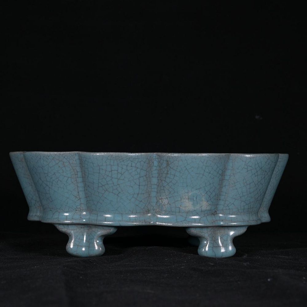 Appraisal: CHINESE BLUE GLAZED PORCELAIN FOOTED BOWL Chinese blue glazed porcelain