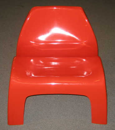 Appraisal: LUIGI COLONI Red-orange molded fiberglass chair designed in manufactured by