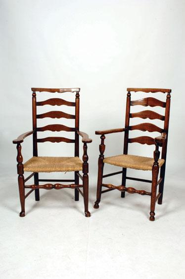 Appraisal: A NEAR PAIR OF ASH AND ELM LADDERBACK ARMCHAIRS with