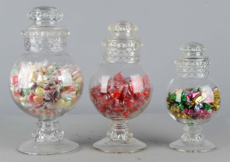 Appraisal: Lot Of Glass Countertop Candy Display Jars All jars have