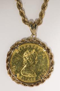 Appraisal: Canadian maple leaf gold coin and k yellow gold pendant