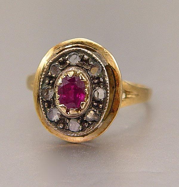 Appraisal: ANTIQUE K RUBY DIAMOND RING yellow gold ring centers an