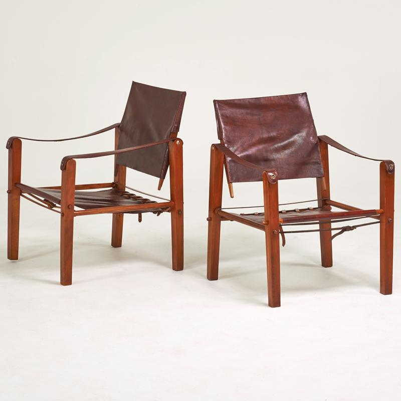 Appraisal: KAARE KLINT RUD RASMUSSENS SNEDKERIER Pair of Safari lounge chairs