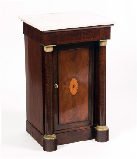 Appraisal: A th century French Empire style mahogany bedside cupboard the