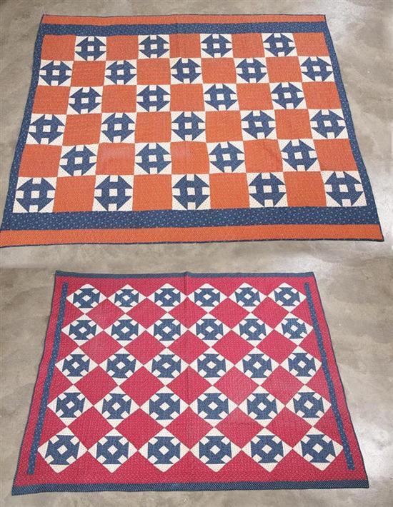 Appraisal: TWO QUILTS Patchworks in red and blue and wine and