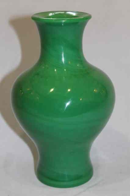 Appraisal: A CHINESE PEKING GREEN BALUSTER GLASS VASE high