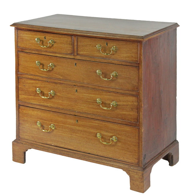 Appraisal: A George III mahogany chest of drawers the cross-banded top