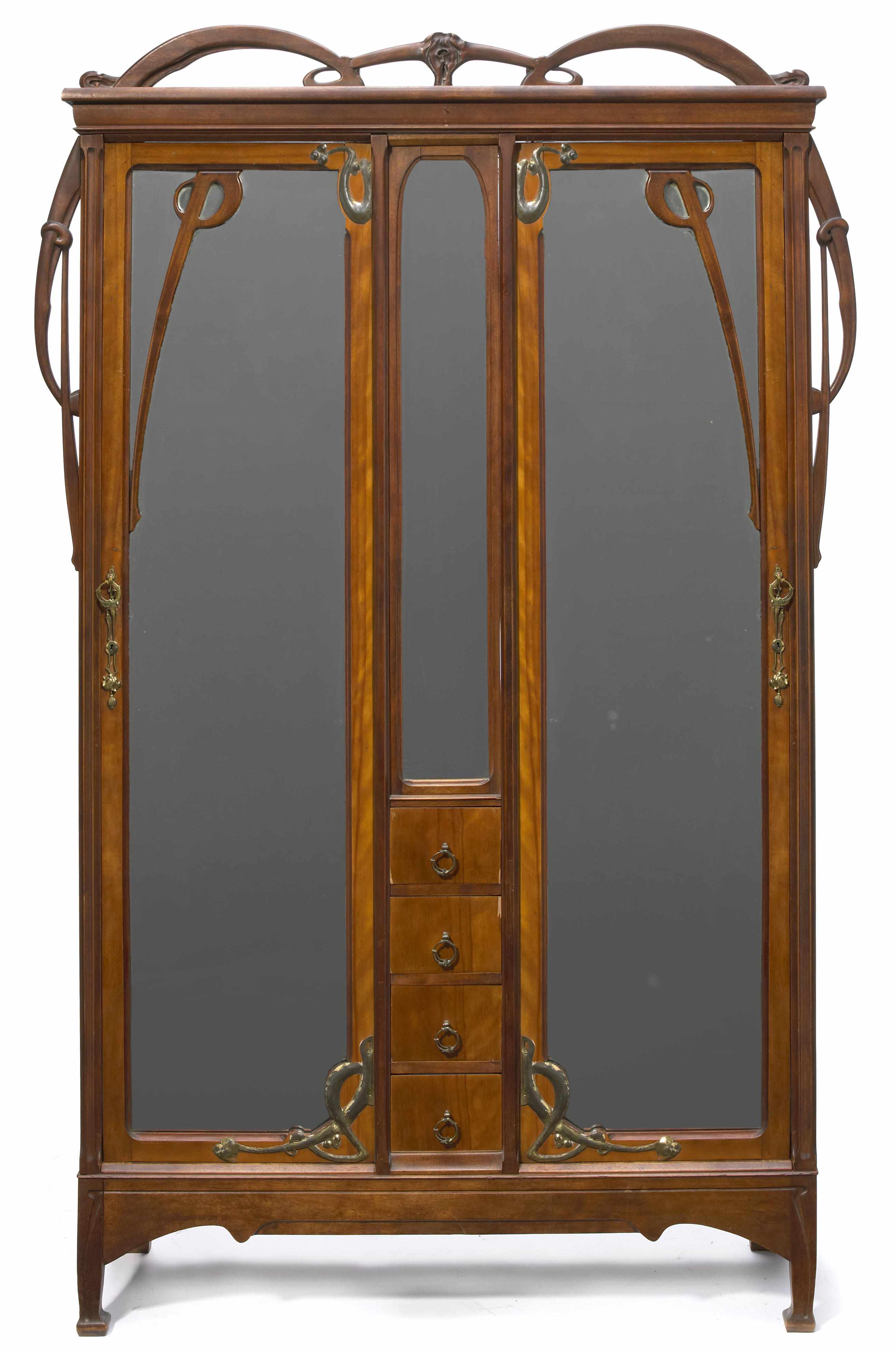 Appraisal: A Leon Benouville carved walnut and brass armoire circa height